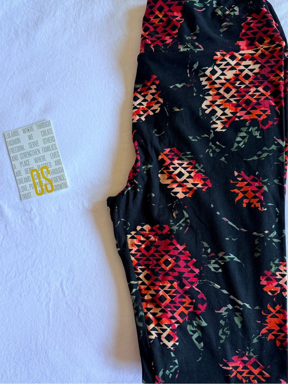 LuLaRoe Black Leggings with Red and Orange Geometric Floral Print